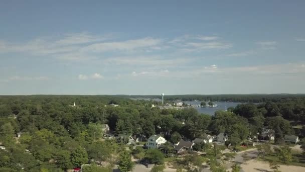 Rising Aerial Shot Overlooking Pentwater Lake Downtown Pentwater Michigan — стокове відео