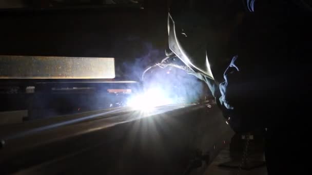 Man Work Welding Beams Together — Stock Video