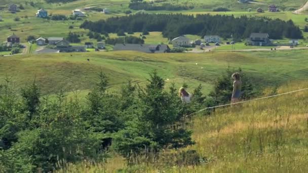 Two Women Walk Hill Patch Trees Out Sight Rolling Hills — Stock Video