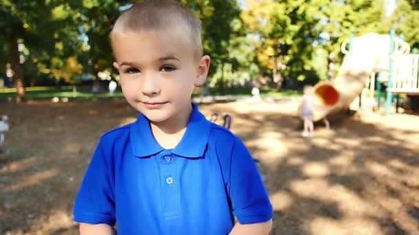 Blonde Boy Blue Shirt Looks Slow Motion — Stok video