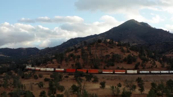 Freight Train Driving Mountain Curve Tehachapi California Aerial — Video