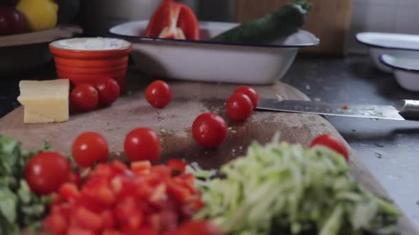 Tomatoes Being Dropped Wooden Chopping Board Slow Slow Pan Right — Video