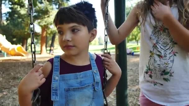 Girl Swing Set Shyly Looks She Bullied Someone Out Frame — Stok video