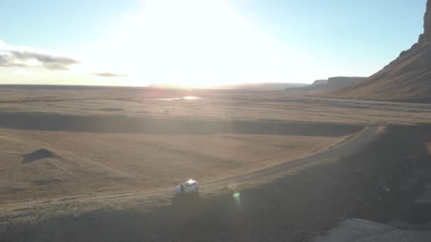 Aerial Orbital Shot Lone Car Parked Vast Landscape — Stock videók