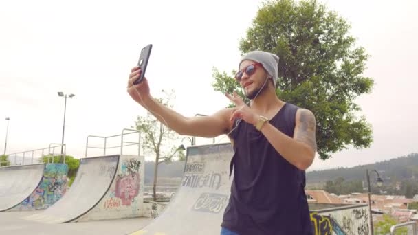Young Boy Taking Selfie Skate Park Graffiti Background — Wideo stockowe
