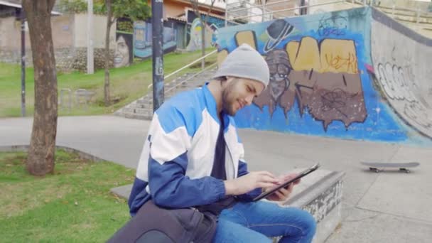 Young Boy Using Tablet Outdoors — Video