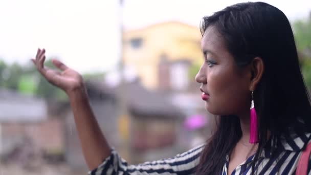Sad Nostalgic Asian Girl Catching Raindrops Hand Standing Outdoor — Stockvideo