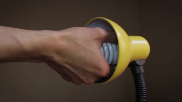 Close Hand Taking Light Bulb Yellow Lamp — Stok Video