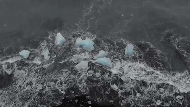 Slow Motion Panning Drone Shot Waves Crashing Black Sand Beach — Stockvideo