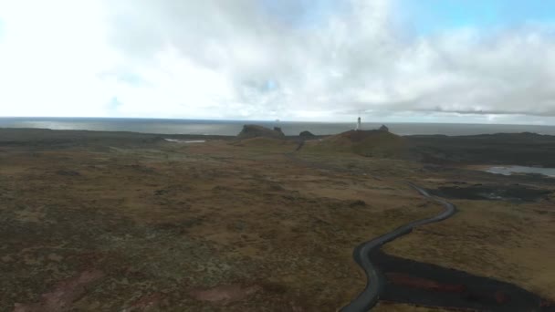 Wide Aerial Shot Lighthouse Bleak Surrounding Coastline — Videoclip de stoc