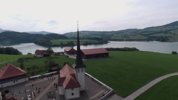 Aerial Flight Church Hautville Village Switzerland — Stockvideo