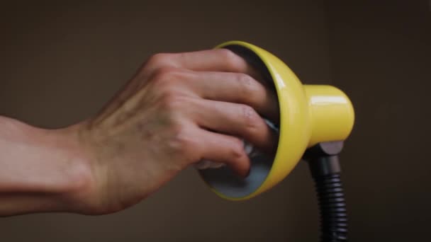 Close Hand Putting Light Bulb Yellow Lamp — Vídeo de Stock