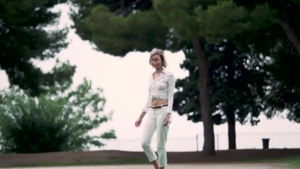 Attractive Woman Walking Park Slow Motion — Vídeo de stock