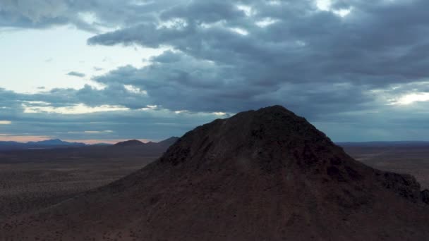 Blue Storm Clouds Gathering Rocky Hill Mojave Desert Aerial Pan — Video Stock