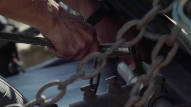 Working Man Tightening Bolt Wrench Farm Machinery Close Hands — Stockvideo