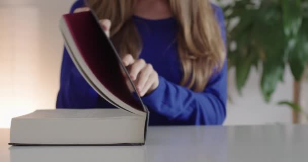 Woman Opens Book — Stock video