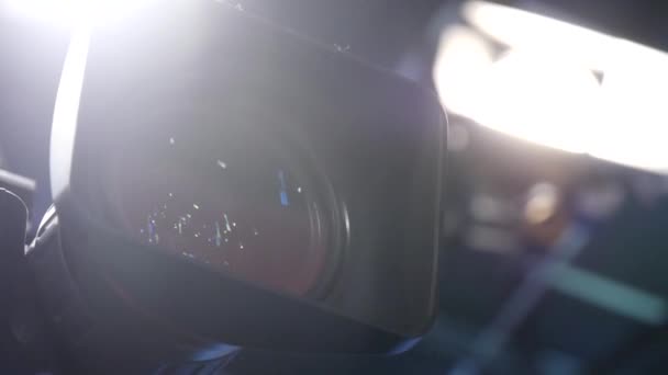 Close Video Camera Lens Bright Production Lights Set — Stockvideo