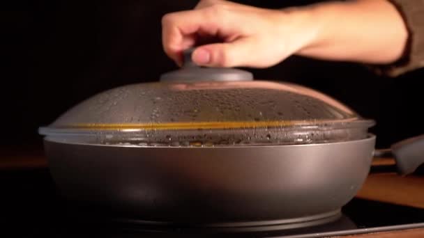 Lot Steam Opening Frying Pans Lid — стоковое видео