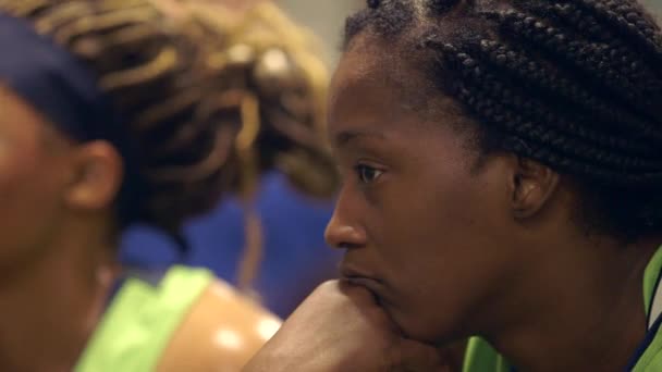 African American Female Basketball Player Listens Pep Talk Locker Room — Vídeo de stock