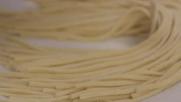 Closeup Freshly Cut Pasta Noodles Placed Plate Cooking — Vídeo de stock