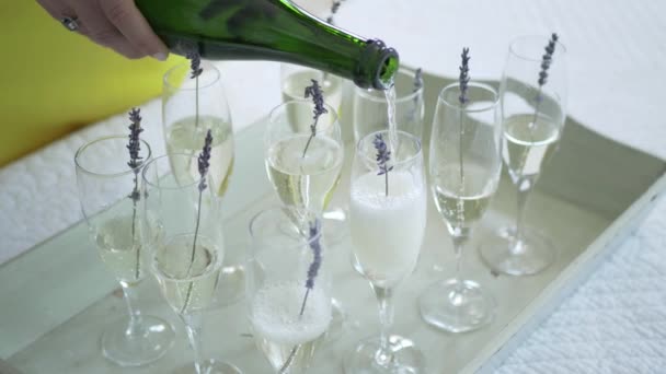 Champagne Pouring Beautiful Glass Lavender Decoration — Vídeo de Stock