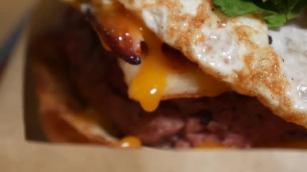 Close Gourmet Burger Cheese Egg Yolk Dripping — Stock Video