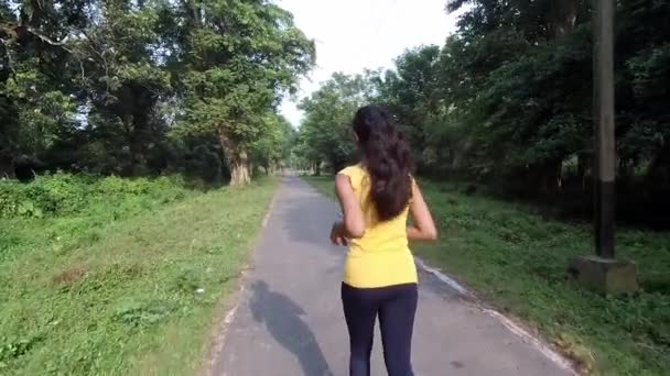 Alone Teenager Asian Girl Running Jogging Road Forest Morning Sunrise — Stockvideo