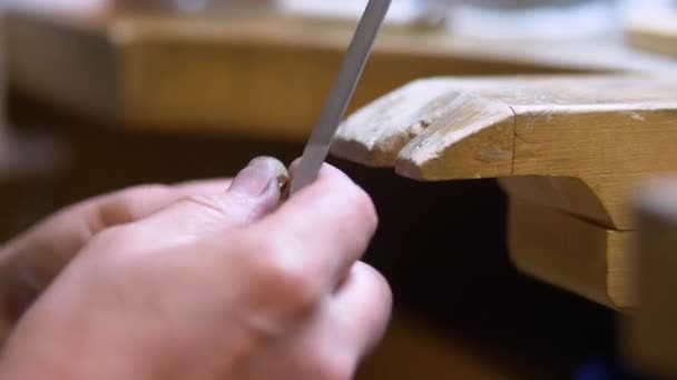 Male Jewelry Maker Hand Filing Piece Jewellery Workshop — Wideo stockowe