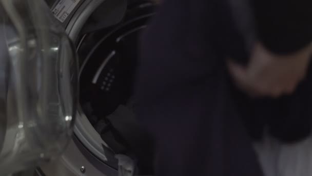 Woman Empties Washing Machine Her Clean Clothes Washing — Wideo stockowe