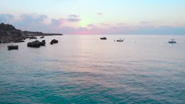 Rising Aerial Shot Water Konnos Bay Sunset Pink Glow — Wideo stockowe