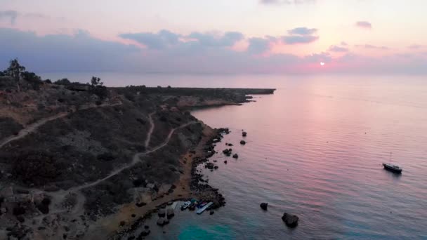 Aerial Drone Shot Konnos Bay Dusk Pink Purple Glow — Stockvideo