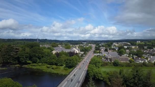 Motorbike Gang Travel Convoy River Straight Road Small Town Sunny — Stockvideo