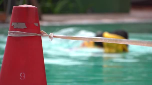Slow Motion Southeast Asian Kids Swimming Splashing Pool Amongst Orange — Stockvideo