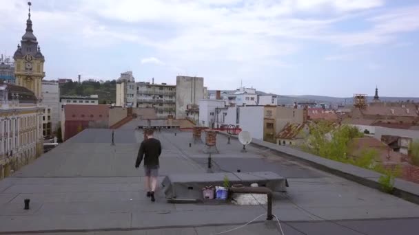 Tracking Shot Young Adult Male Walking Abandoned Roof Top — Stock videók