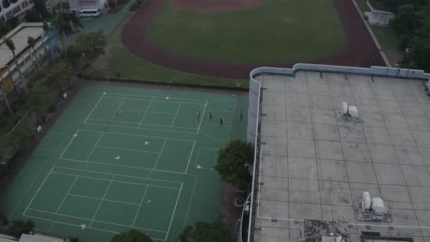Drone Shot Taiwanese Kids Playing Basketball School Field — Wideo stockowe