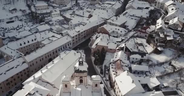 Flying Christian Church Rooftops Covered Snow Mining Town Banska Stiavnica — Stock Video