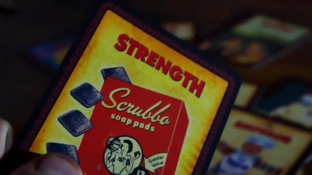 Slow Panning Shot Strength Tarot Card Placed Back Pile One — Vídeo de Stock