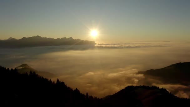 Descending Alongside Forest Hill Sea Clouds Sunset Alps Background Switzerland — стоковое видео