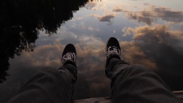 Young Male Enjoying Sunset Lake — Stock Video