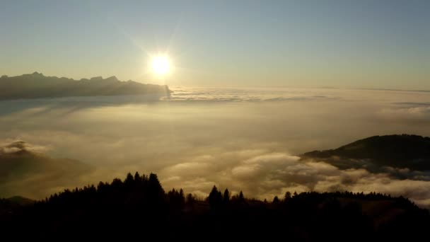 Aerial Orbit Hill Surrounded Sea Clouds Sunset Switzerland — Vídeo de Stock