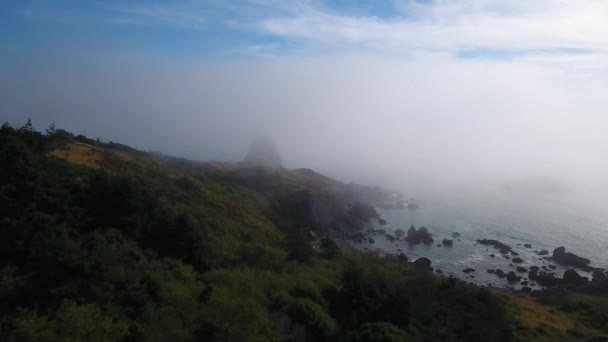 Aerial Drone Shot Pushing Mysterious Rock Formation Shrouded Fog — Stockvideo