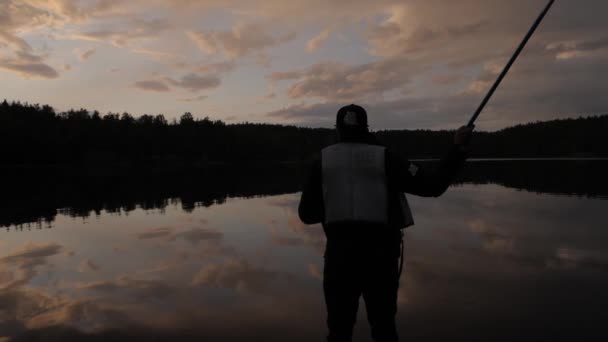 Sillhouted Footage Young Lad Fishing Slowmotion — Stock videók