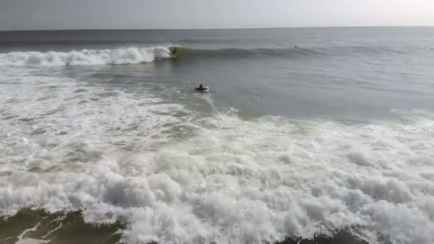 Epic Drone Tracking Shot Surfer Riding Wave — Stock videók