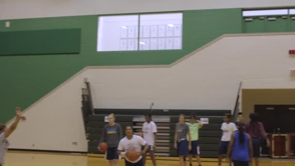 Female Basketball Player Hits Nothing Net Shooting Three Pointer Practice — Stockvideo