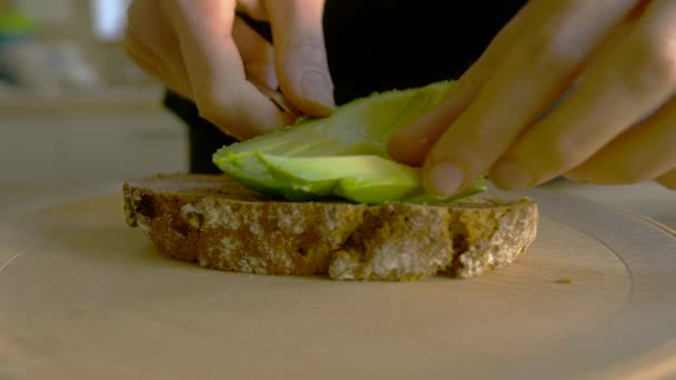 Slow Motion Shot White Woman Making Avocado Toast Side Close — Stock video
