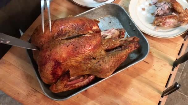 Carving Big Roast Turkey Putting Pieces Plates — Stockvideo