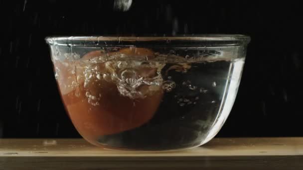 Slow Tomato Dropping Bowl Water — стокове відео