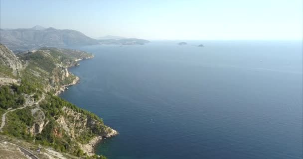 Croatian Coastline Covered Rocks Trees Beautiful Blue Water Skies Sunny — Wideo stockowe