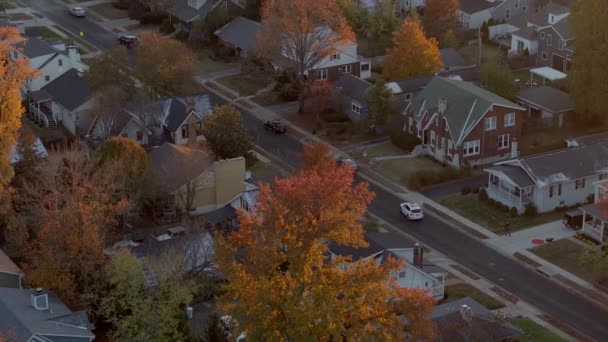 Aerial Suburban Neighborhood Autumn Car Pulls Driveway — Video