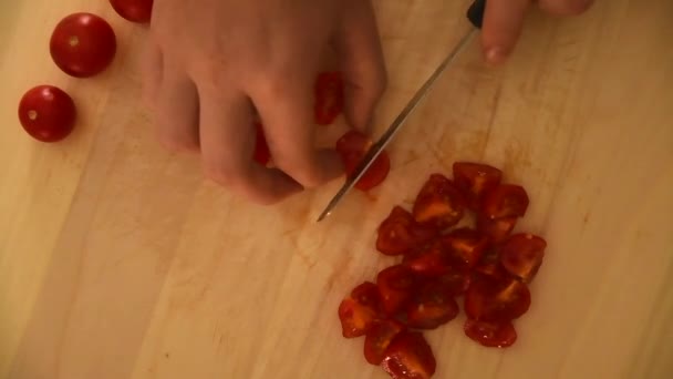 Female Hand Cutting Tiny Juicy Tomatoes Light Wooden Chopping Board — Stok video